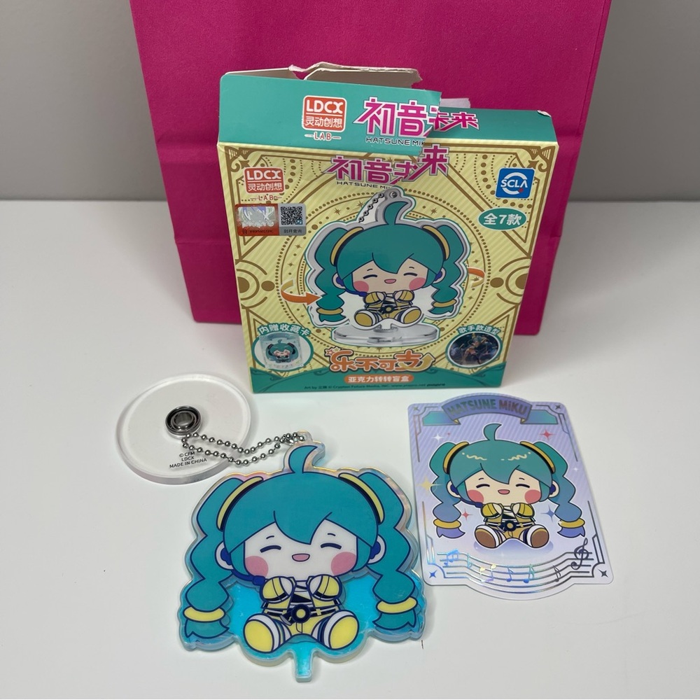 Hatsune Miku Acrylic Keychain & Rotatable Stand With Holographic Character Card
